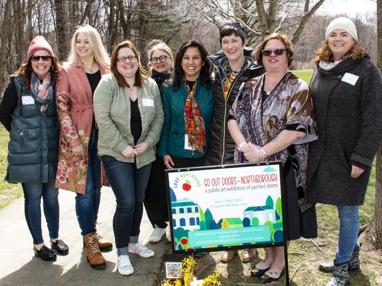 Northboro Cultural Council's Opening Day celebration for its "Go Out Doors" art installation in McAfee park, Northboro, April 9, 2022. Various "dignitaries" running for office present, artists who had created doors and friends. Cold and breezy day.