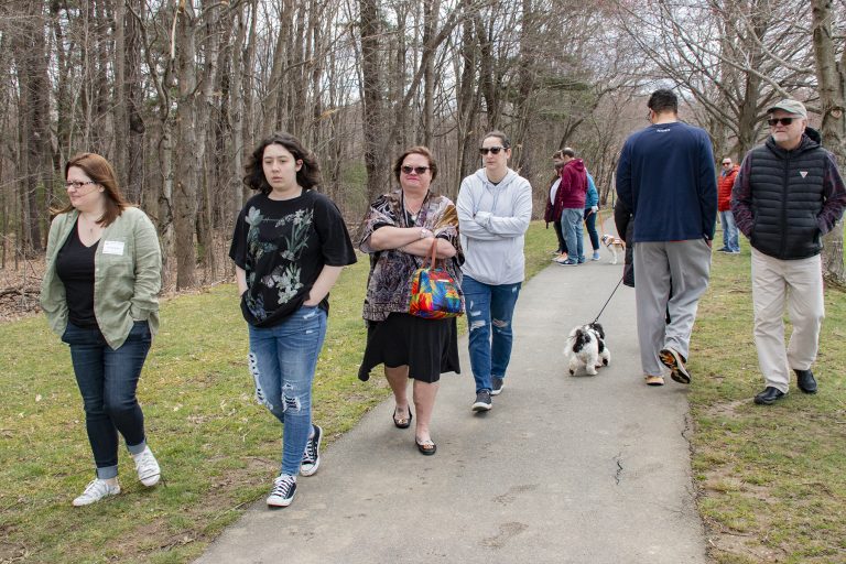 Northboro Cultural Council's Opening Day celebration for its "Go Out Doors" art installation in McAfee park, Northboro, April 9, 2022. Various "dignitaries" running for office present, artists who had created doors and friends. Cold and breezy day.