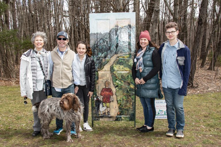 Northboro Cultural Council's Opening Day celebration for its "Go Out Doors" art installation in McAfee park, Northboro, April 9, 2022. Various "dignitaries" running for office present, artists who had created doors and friends. Cold and breezy day.