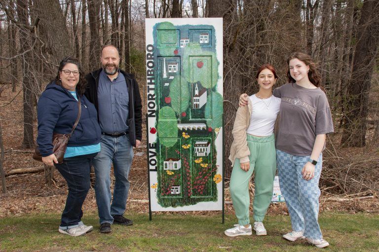 Northboro Cultural Council's Opening Day celebration for its "Go Out Doors" art installation in McAfee park, Northboro, April 9, 2022. Various "dignitaries" running for office present, artists who had created doors and friends. Cold and breezy day.